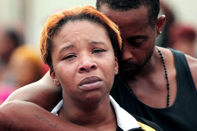 La madre de Michael, Lesley McSpadden y su padrastro, La madre de Michael, Lesley McSpadden y su padrastro,