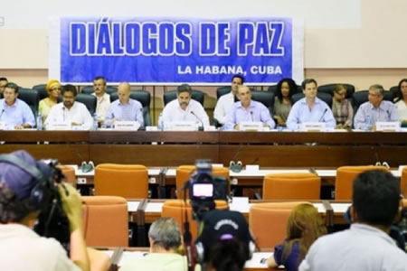 Los delegados de la guerrilla y del gobierno, en Cuba