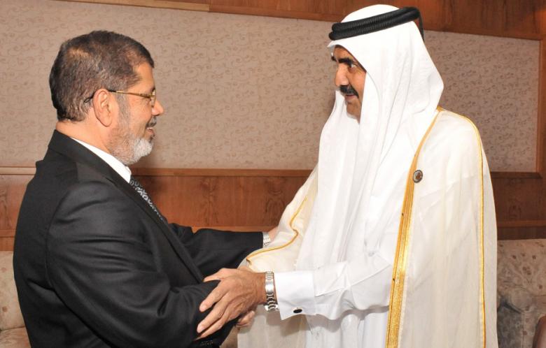 Muhammad Mursi y Hamad bin Jalifa Al Thani Muhammad Mursi y Hamad bin Jalifa Al Thani