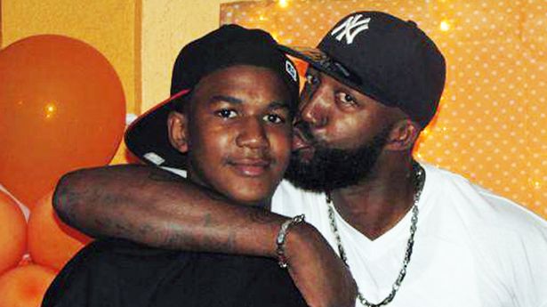 Trayvon Martin-a la izquierda-y su padre