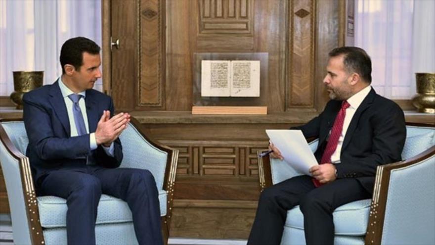 Bashar Al Asad, a la izquierda Bashar Al Asad, a la izquierda
