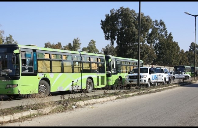 Los autobuses saliendo de Homs