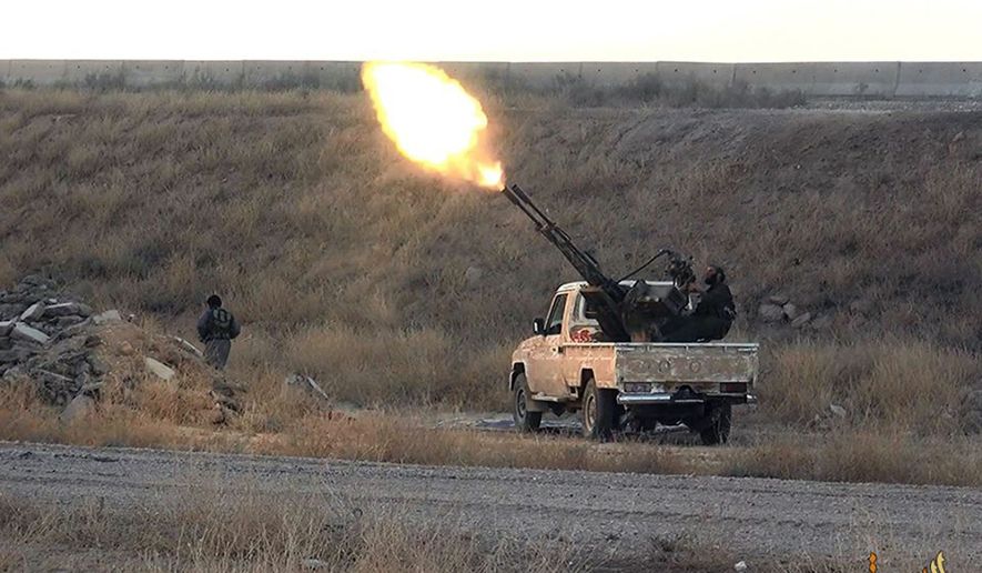 Milicianos del estado islámico disparan a aviones sirios