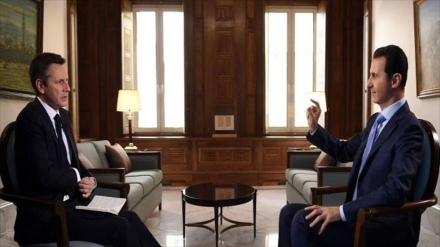 Bashar Al Asad-a la derecha-durante la entrevista. Bashar Al Asad-a la derecha-durante la entrevista.