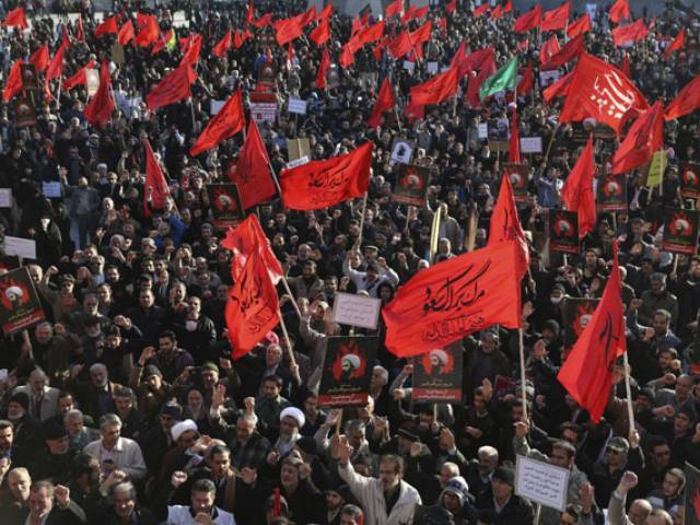 Manifestantes protestando por la ejecución de An Nimr en Irán