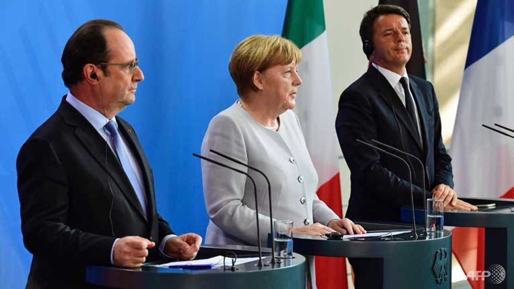 De izquierda a derecha, Hollande, Merkel y Renzi