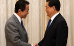 Presidente chino conversa con PM japonés sobre relaciones