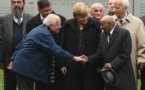 Merkel rinde homenaje a los gitanos víctimas del Holocausto y promete defenderles