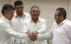 Santos y FARC prometen firmar la paz en seis meses tras sellar pacto sobre justicia